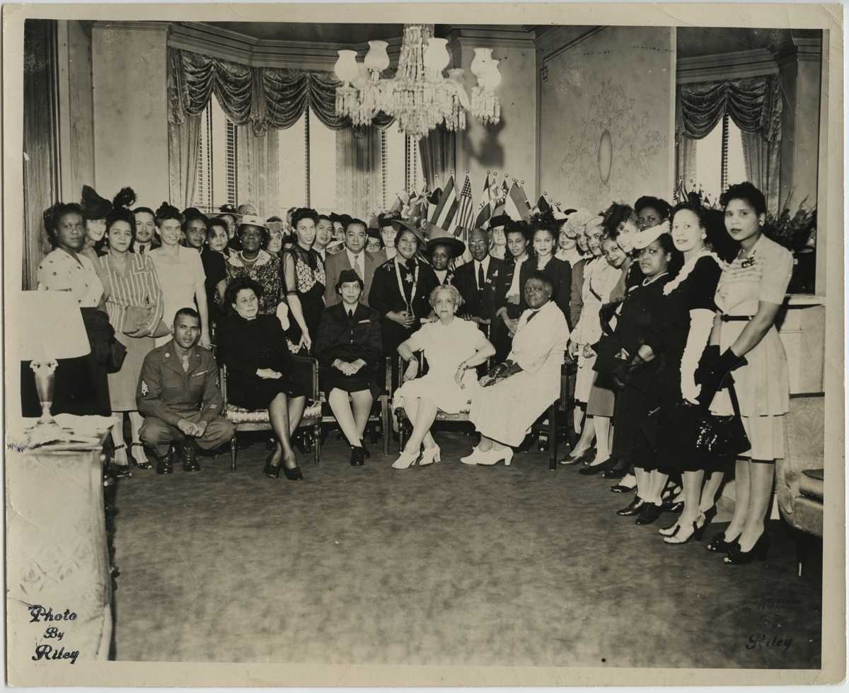 Photograph of Reception at the Council House, including Mary McLeod Bethune and Venita Lewis of the Department of Labor Children’s Bureau