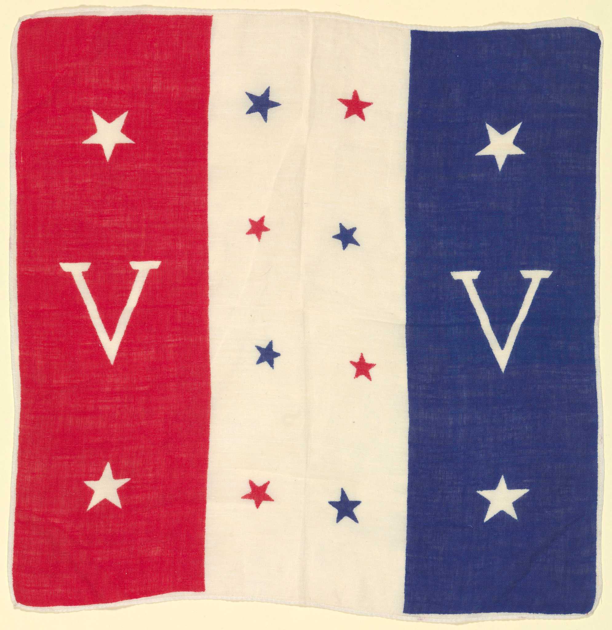 A red, white, and blue linen square handkerchief promoting the Double V campaign of World War II. The white fabric is printed with red and blue dye to create a design of three (3) vertical stripes colored from left to right in red, white, and blue. The blue and red stripes have a block letter "V" in white at the center, with two (2) white five-pointed stars, one each above and below the V. The center white stripe has eight (8) five-pointed stars printed in two colums of four alternating in red and blue. The fabric has a machine-stitched rolled hem and the printed design can be seen on both sides of the fabric.