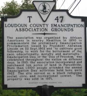 A black and white historical marker for Loudoun County Emancipation Association Grounds.