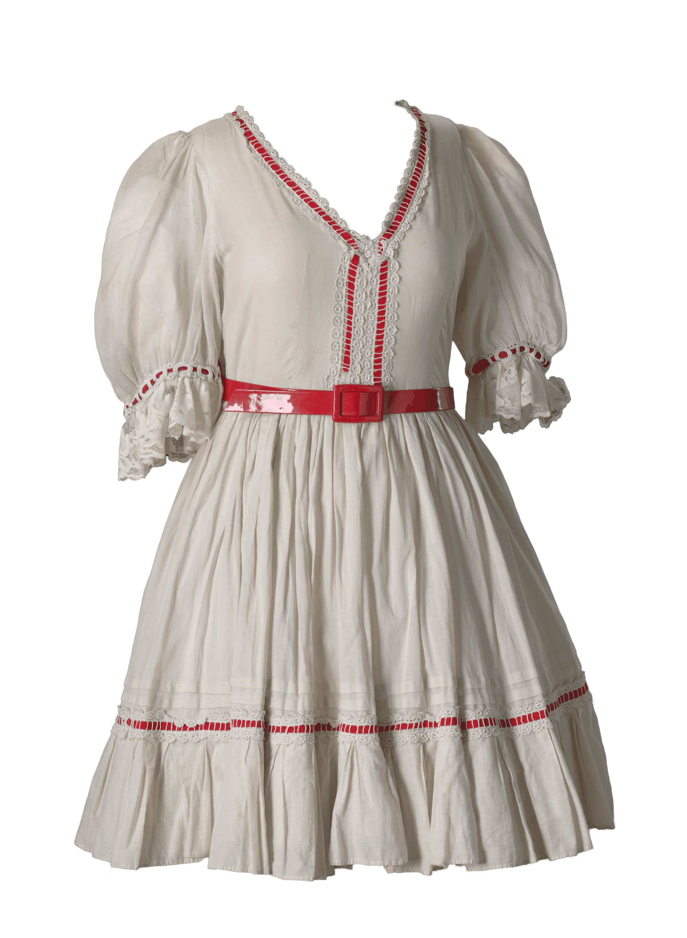 A white costume dress with a-line skirt and red belt and accent colors for Dorothy in The Wiz.