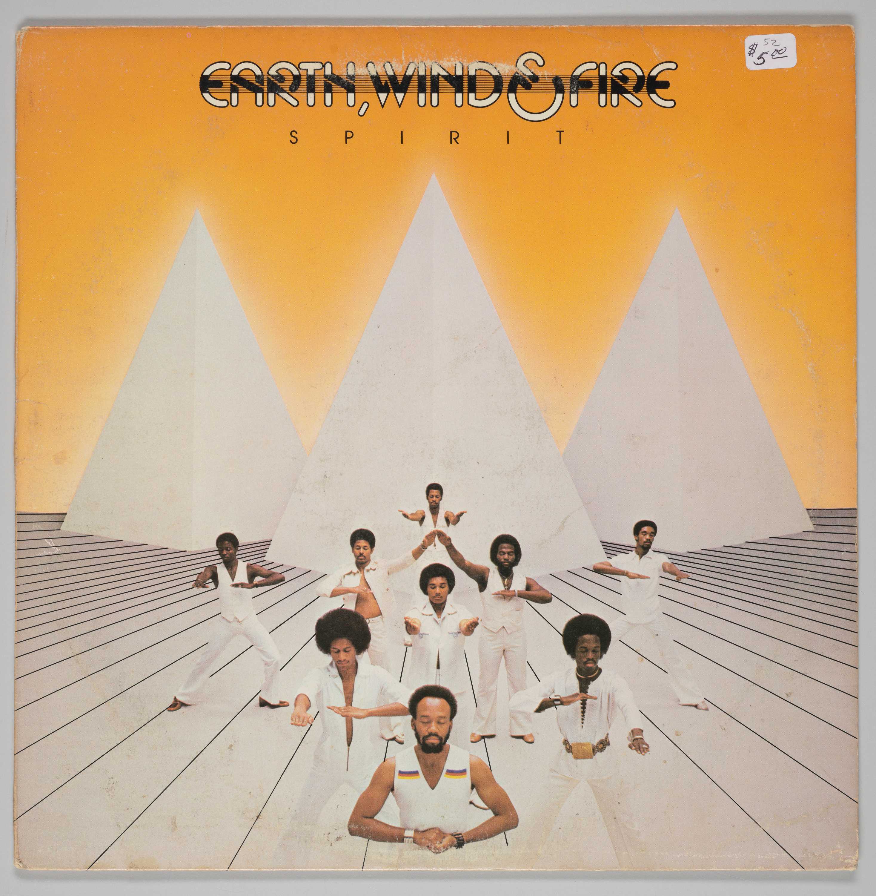 The cover for Earth, Wind & Fire's Spirit has the band's name in fiery letters surrounded by cosmic patterns.