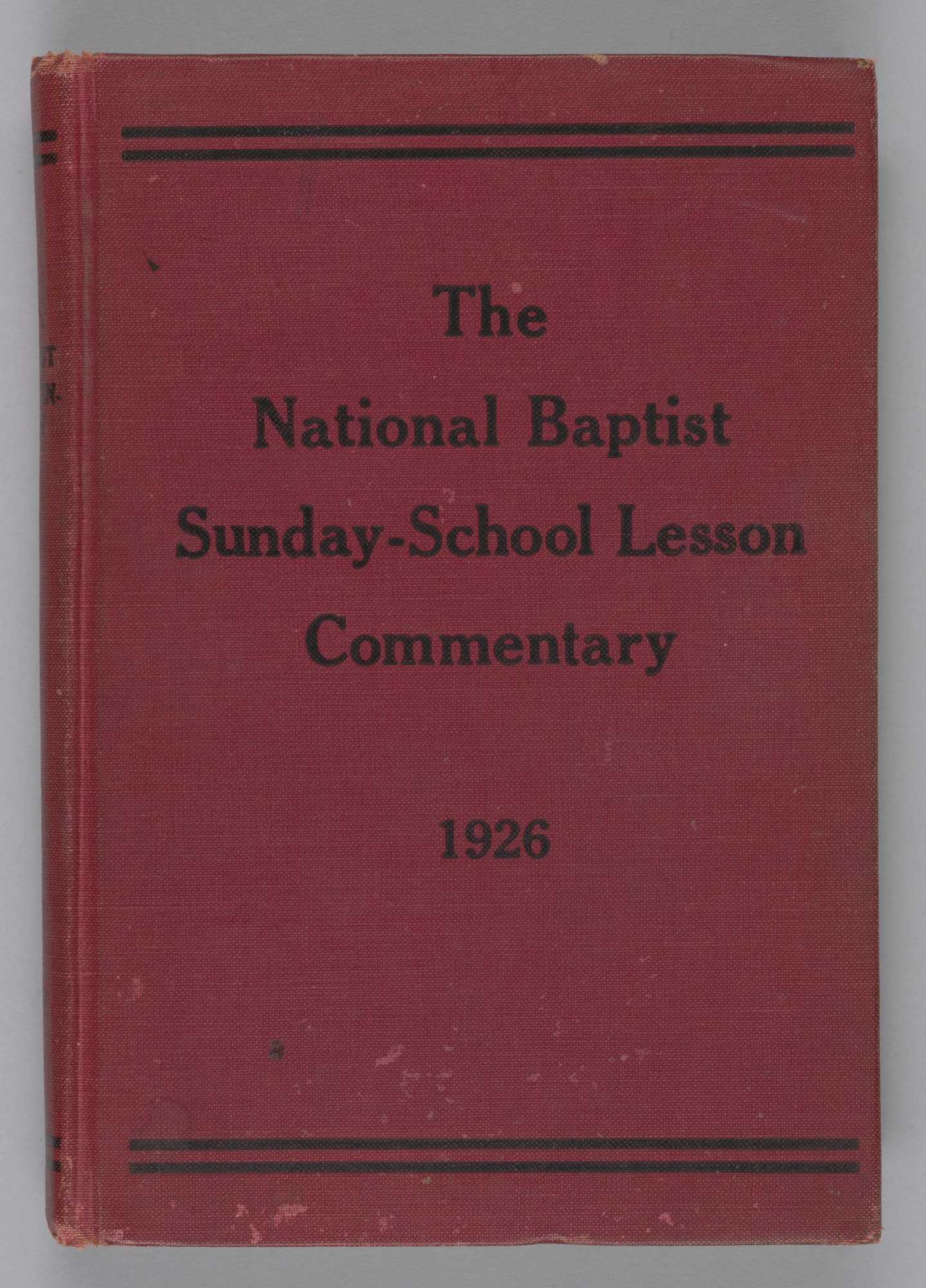 A red hardcover book titled The National Baptist Sunday-School Lesson Commentary.