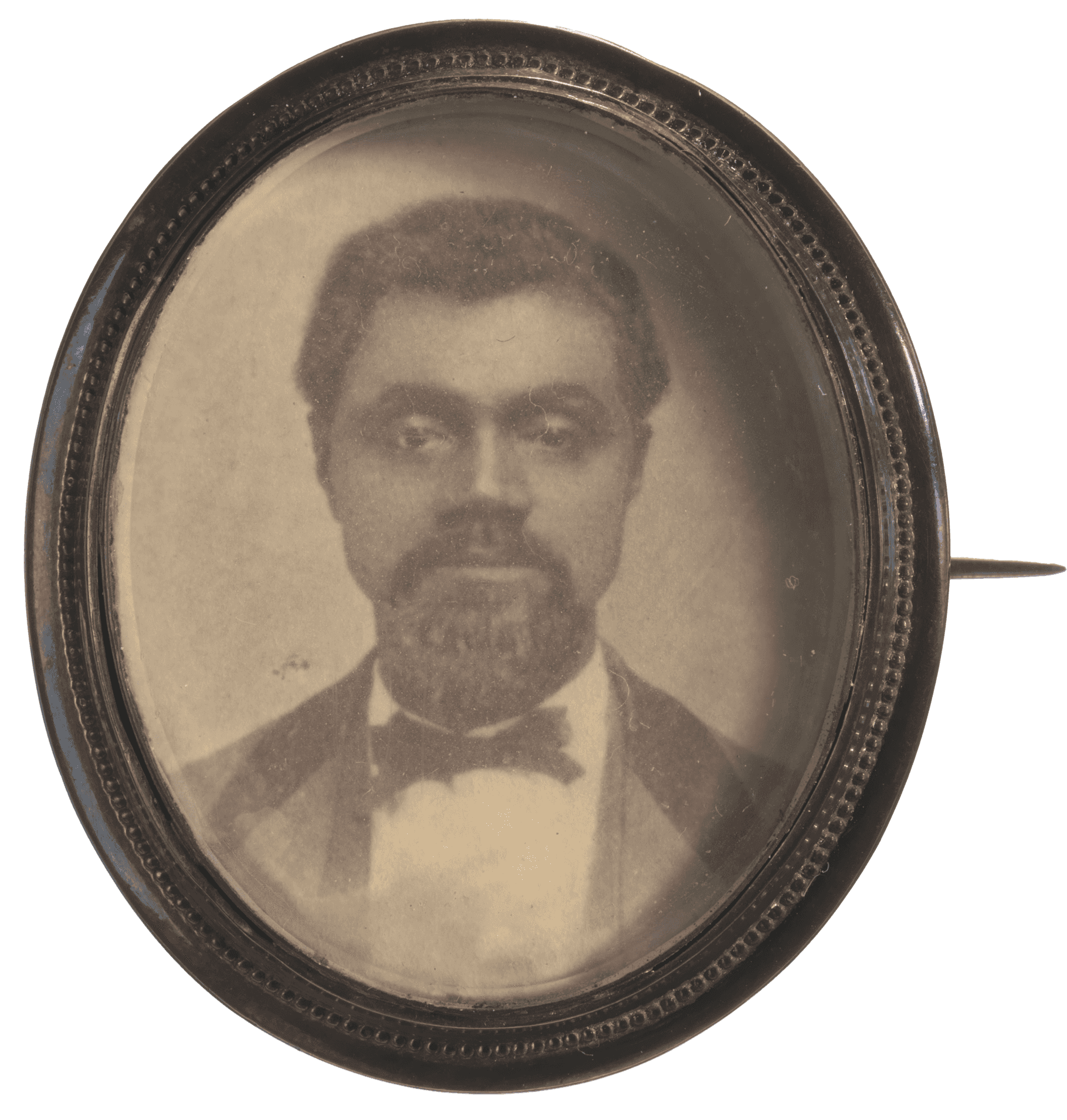 A metal pin back button featuring a photographic image of Sen. W.B. Nash. The pin is oval and made of metal with a slight tarnish. The front features a beaded design around the edge of the picture and the back is slightly indented with a horizontal pin across the middle. The photo is placed loosely in the frame and features a bust shot of Nash wearing a suit jacket and tie. He has a beard and mustache.