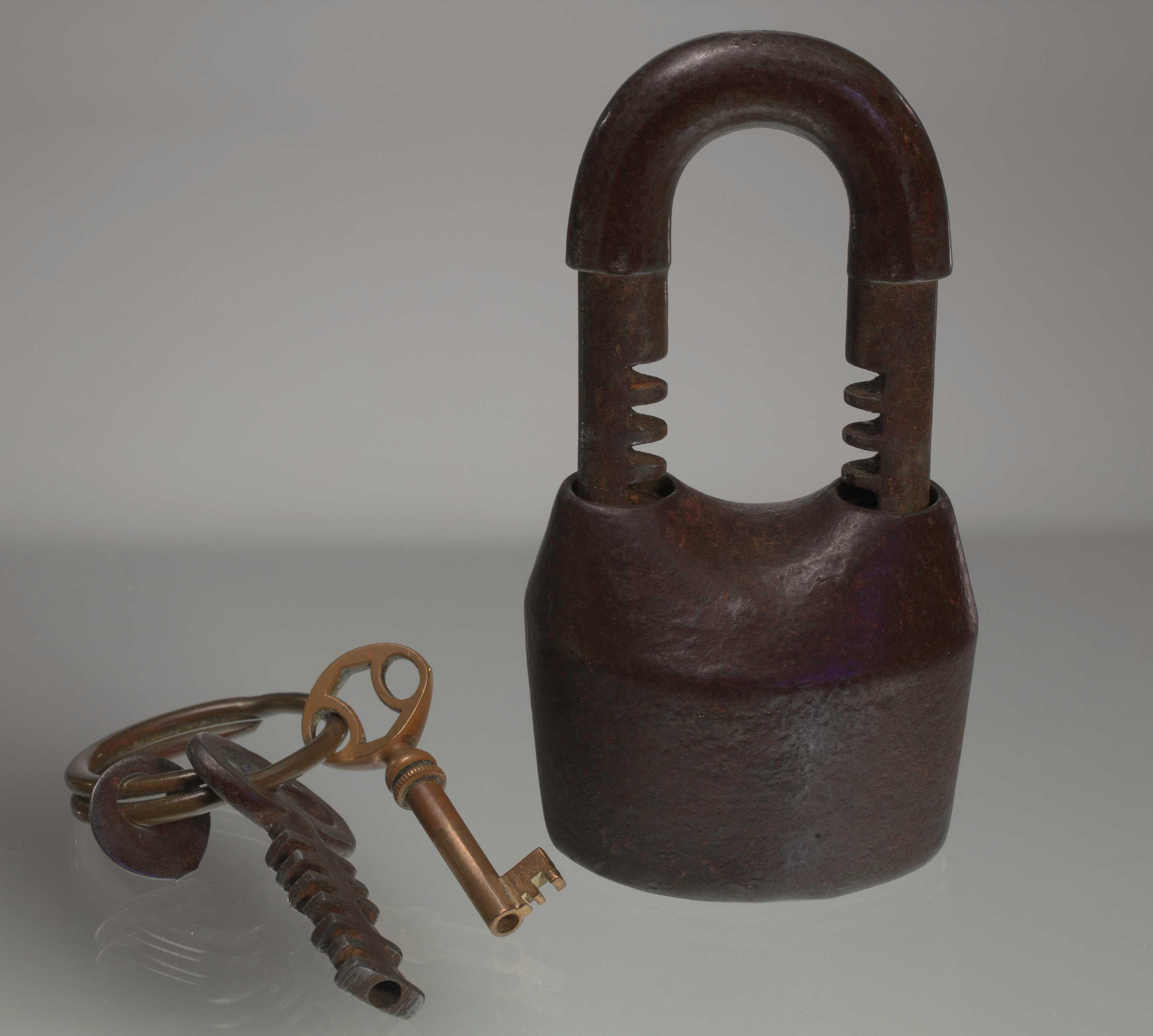 Iron padlock displayed with key chain with 2 keys