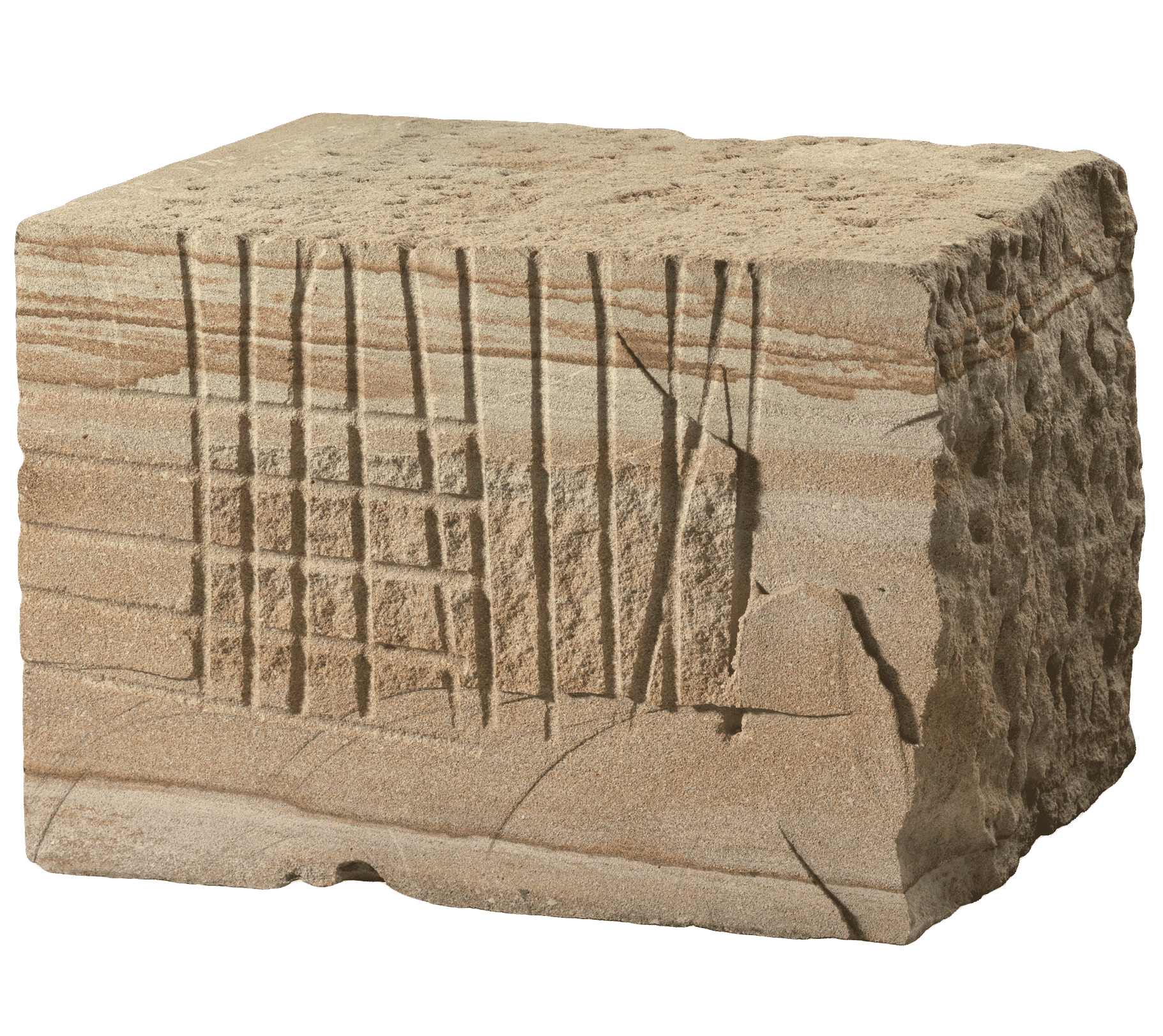 Square block of sandstone with markings.