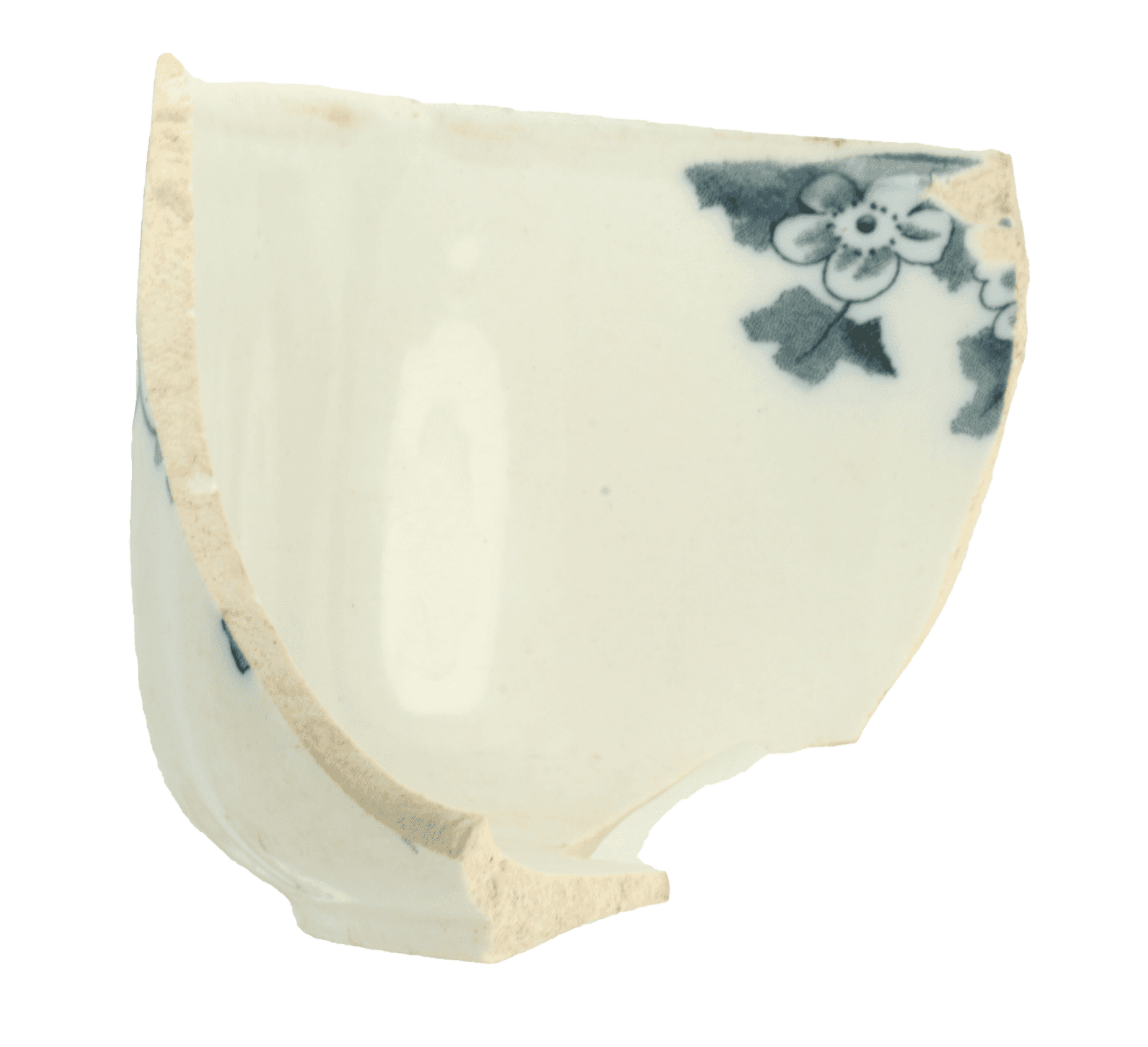 Fragment of a white porcelain tea cup with blue floral design.