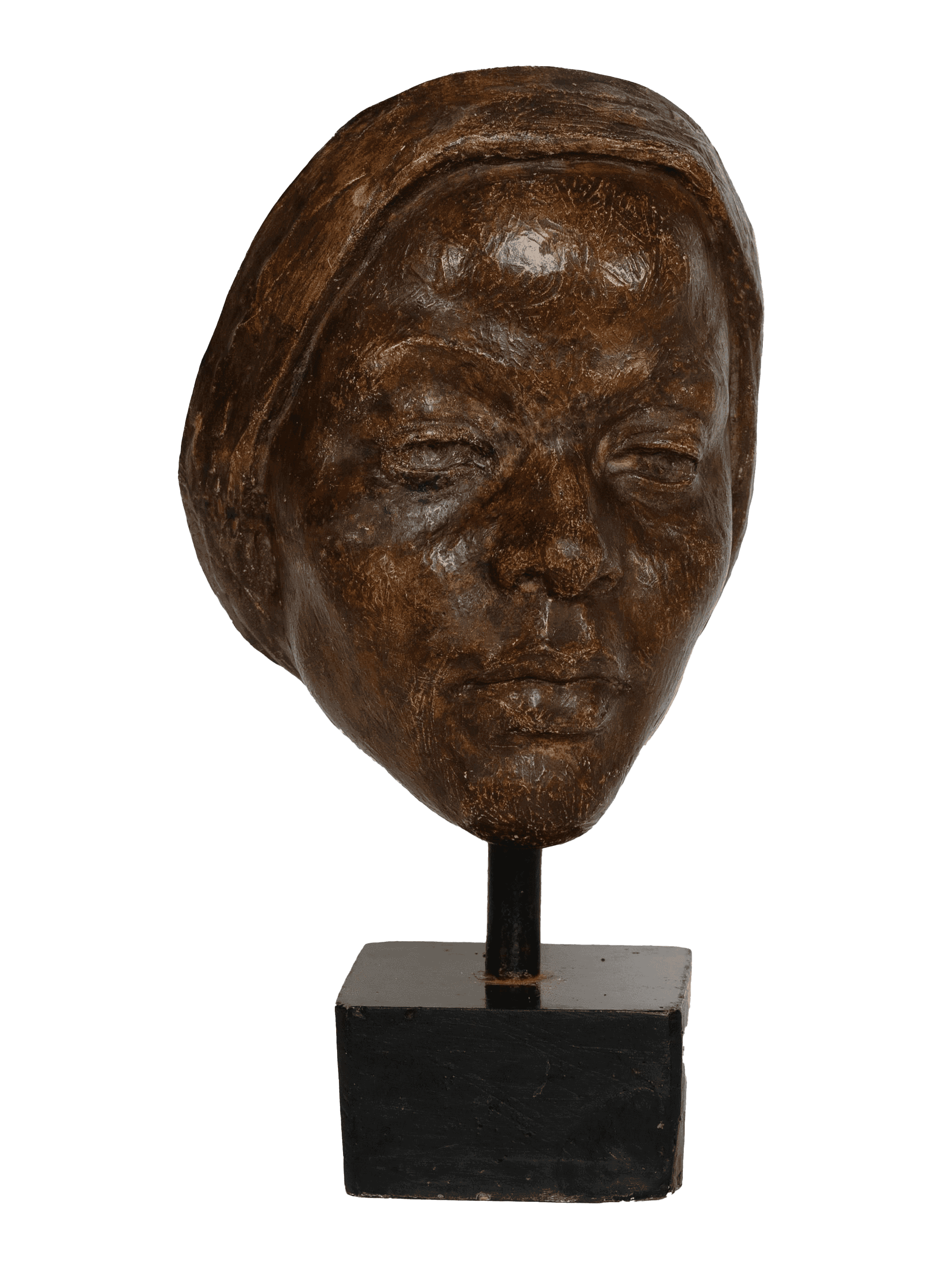 Wooden sculpture of a serene face with closed eyes and a headscarf, mounted on a black base.