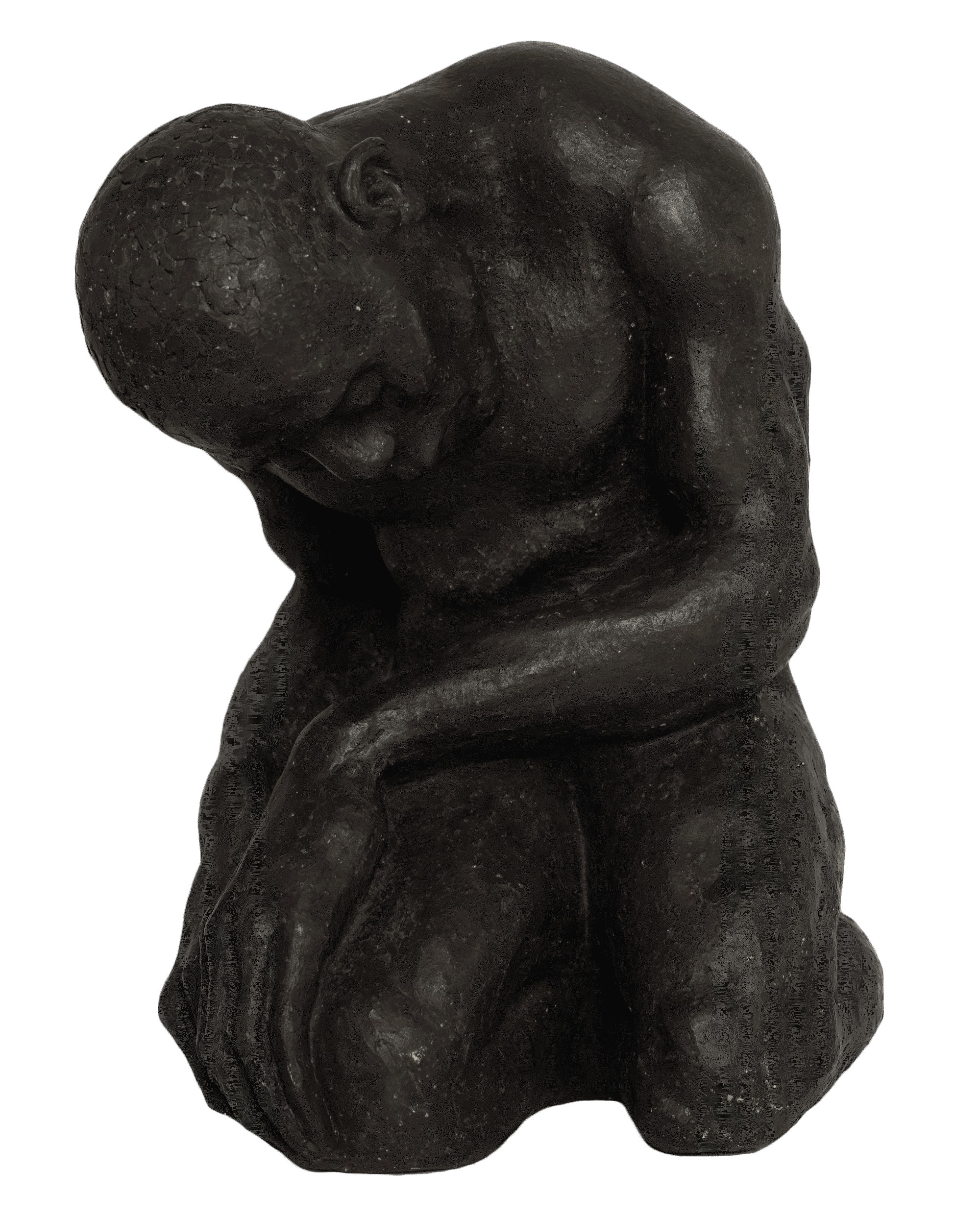 Sculpture of man kneeling with head bowed.